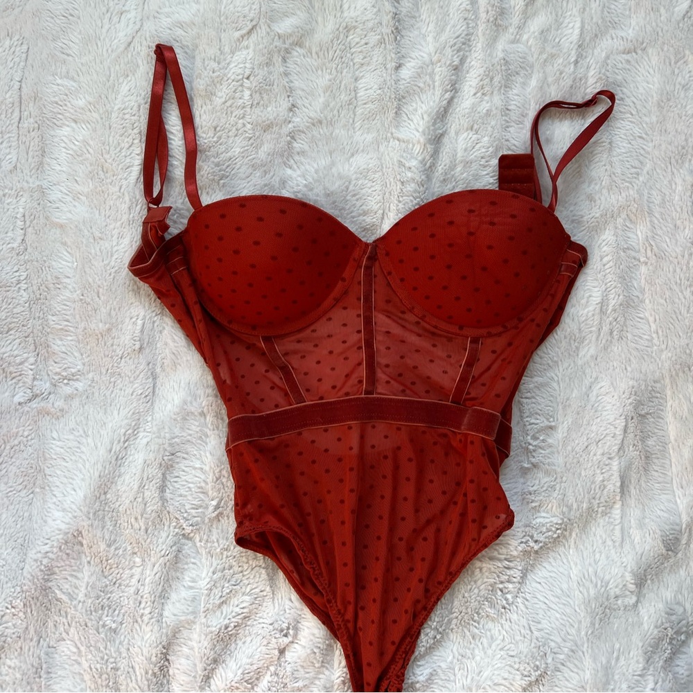 red bodysuit
